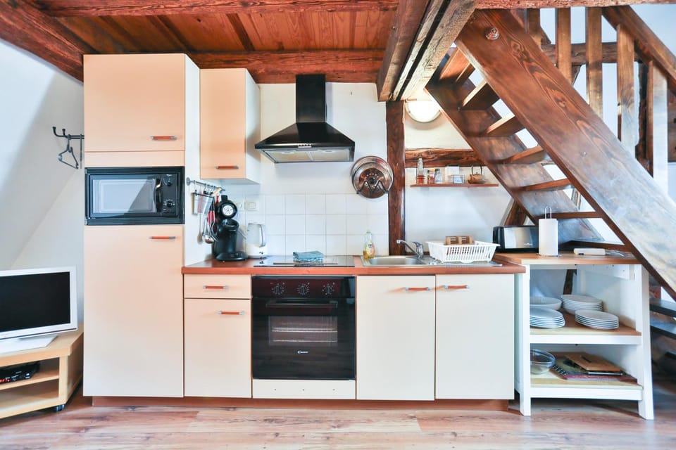 Kitchen or kitchenette, oven, stove, toaster