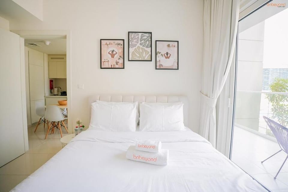 Bnbeyond's Serene Poolside Bliss Apartment in Dubai