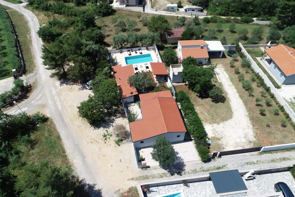 Property building, Natural landscape, Bird's eye view, Street view, Swimming pool