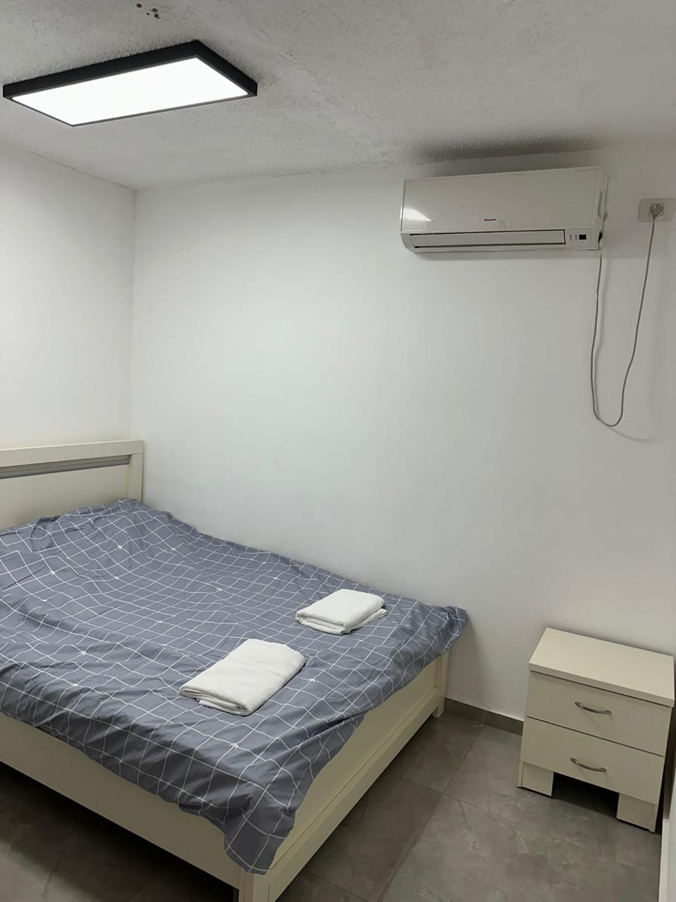 Bed, Photo of the whole room, Bedroom, towels, air conditioner