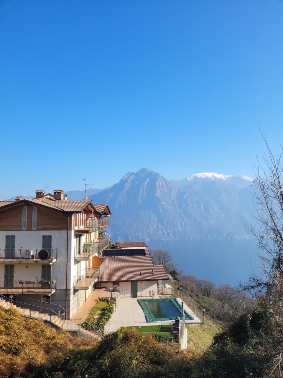 Property building, Day, Natural landscape, Lake view, Lake view, Mountain view, Swimming pool