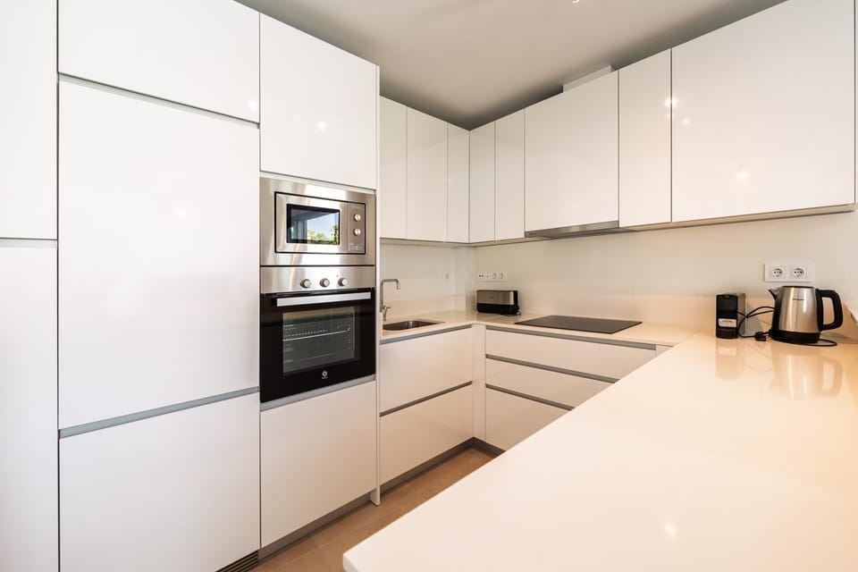 Kitchen or kitchenette, oven, stove, toaster