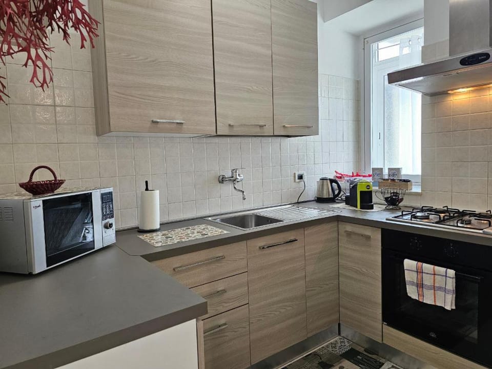 Kitchen or kitchenette, oven, stove
