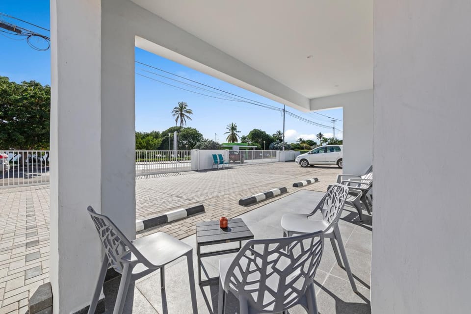 Patio, Day, View (from property/room), Seating area, Sea view, Street view, Parking