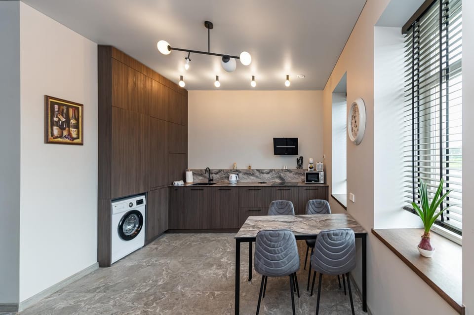 TV and multimedia, Kitchen or kitchenette, Living room, Seating area, Dining area, toaster, washing machine, air conditioner