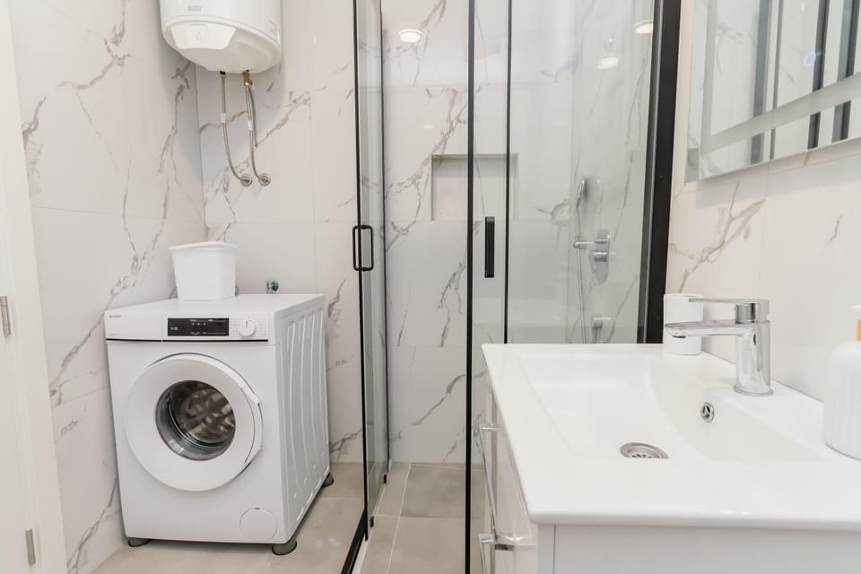 Shower, Bathroom, towels, washing machine, dryer