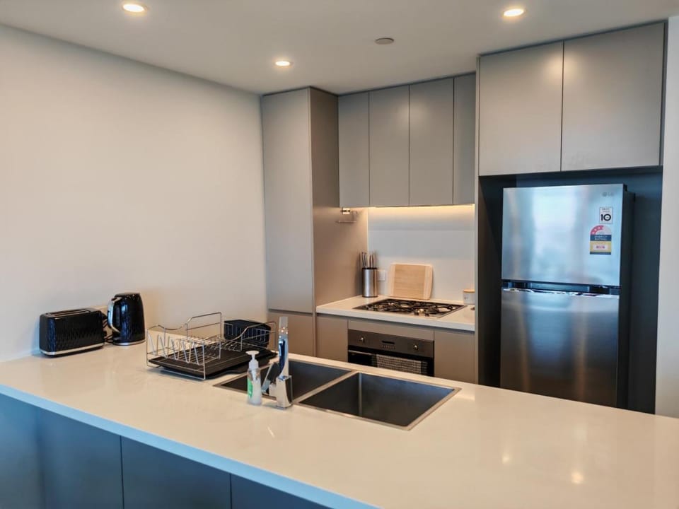 Kitchen or kitchenette, oven, stove, toaster