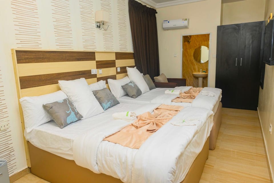 Bed, Photo of the whole room, Bedroom, towels, air conditioner