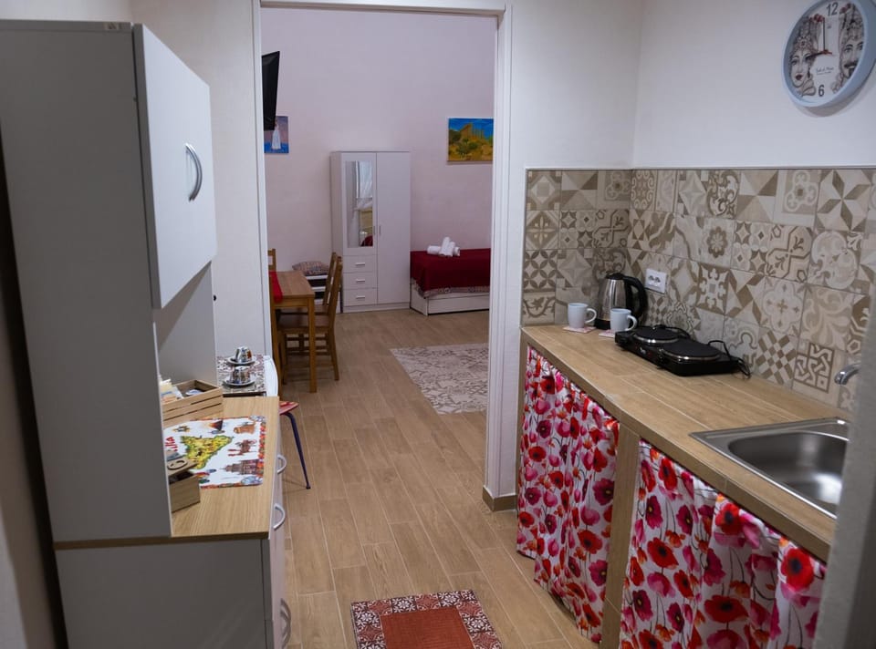 Kitchen or kitchenette, Photo of the whole room, Seating area, Dining area, stove