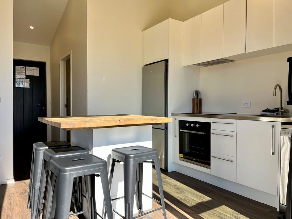 Seating area, dishwasher, oven, stove, kitchen
