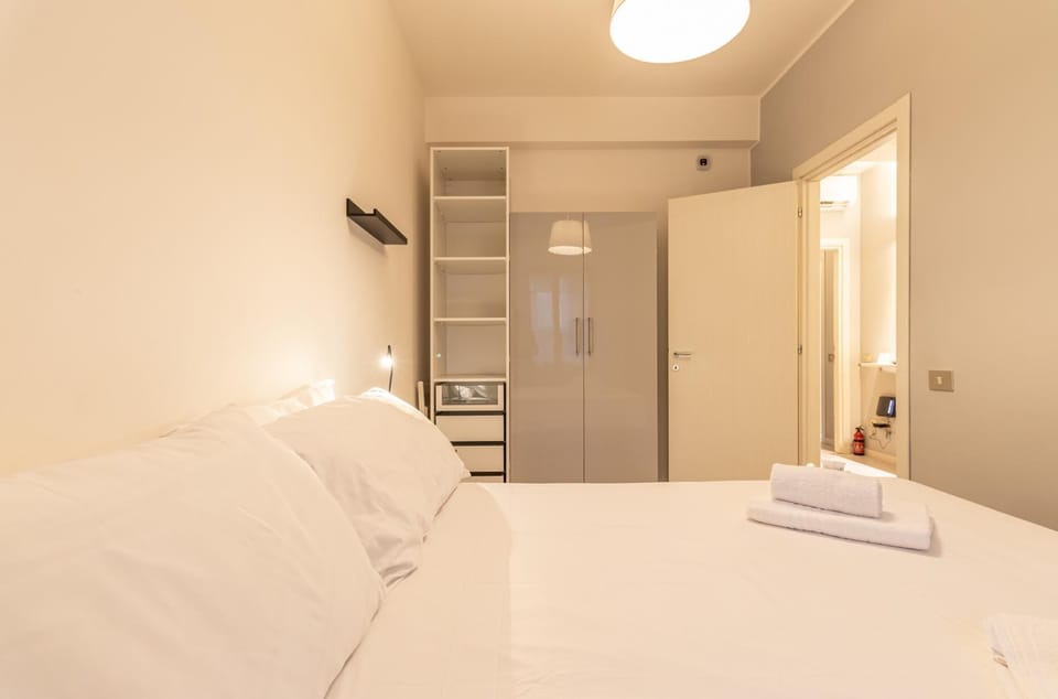 Bed, Photo of the whole room, Bedroom, towels, wardrobe