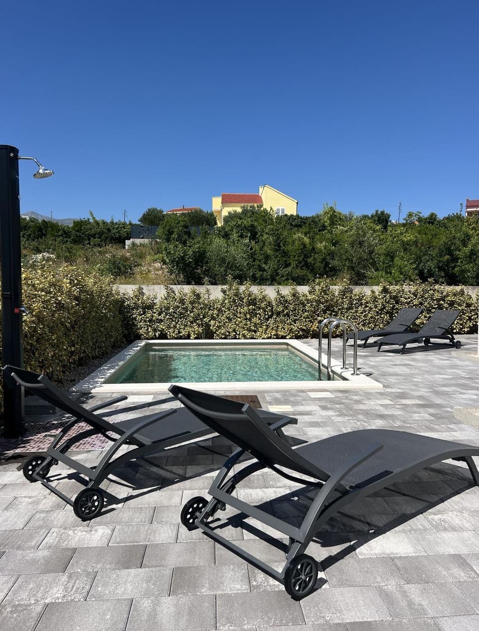 Swimming pool, sunbed