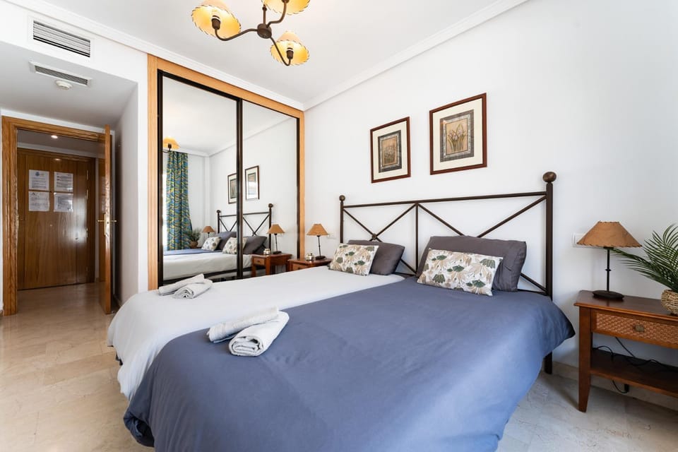 Bed, Photo of the whole room, Bedroom, towels, air conditioner