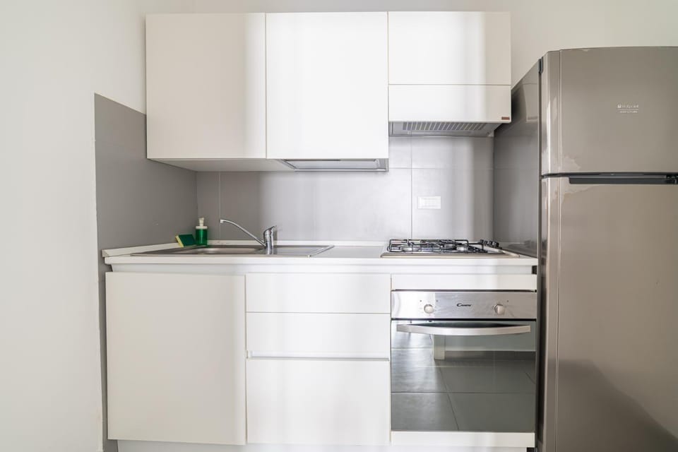 Kitchen or kitchenette, oven, stove