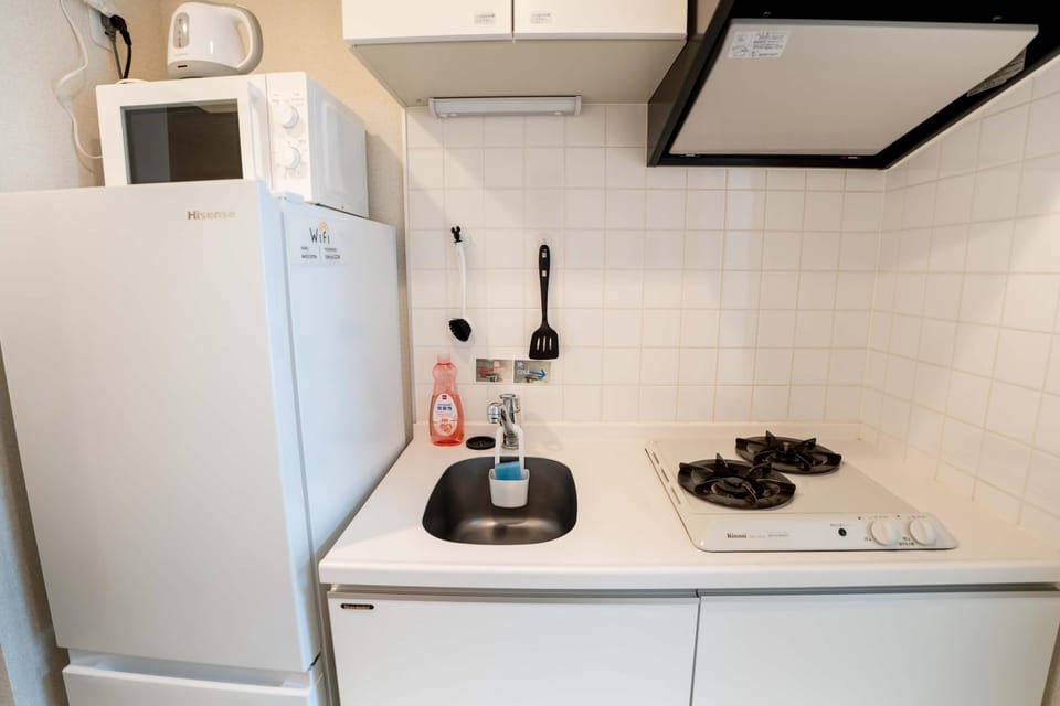 Kitchen or kitchenette, stove