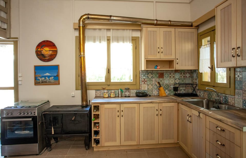 Kitchen or kitchenette, oven, stove, toaster