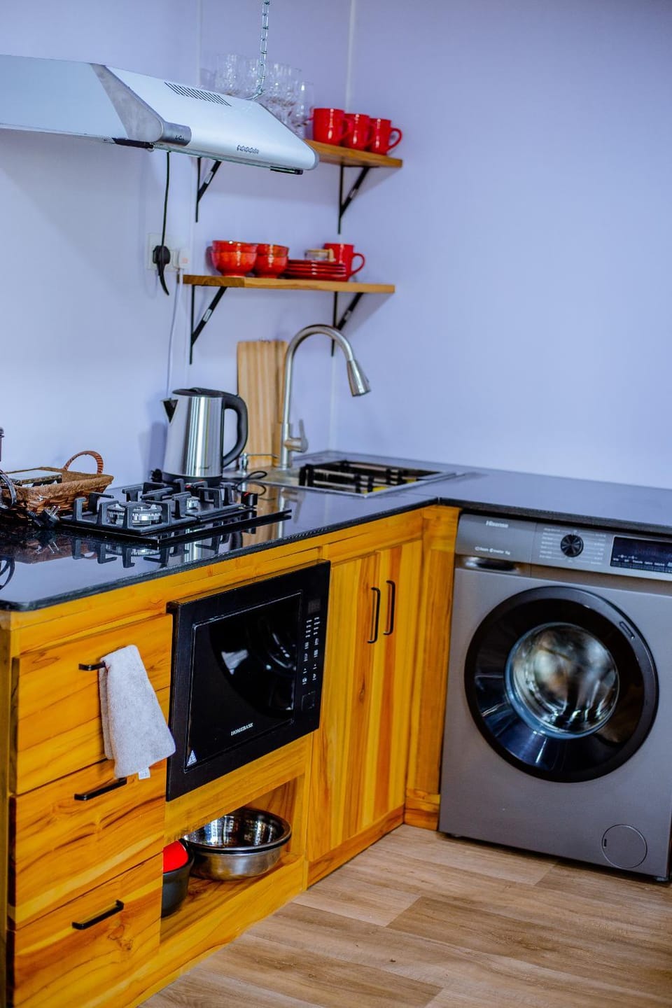 Kitchen or kitchenette, stove, washing machine