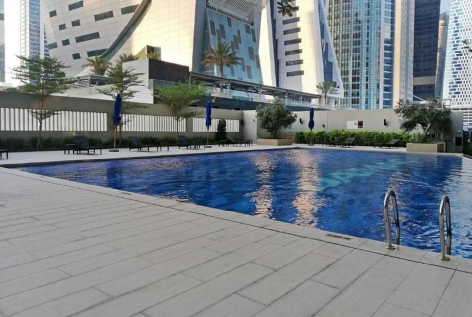 Stylish 1br Merano Tower Pool Parking Apartment in Dubai