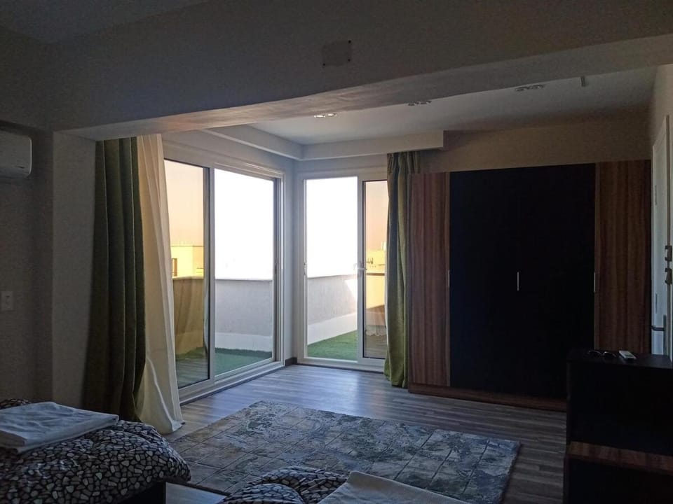 Fully air-conditioned hotel apartment in front of Al Rehab Apartment in New Cairo City
