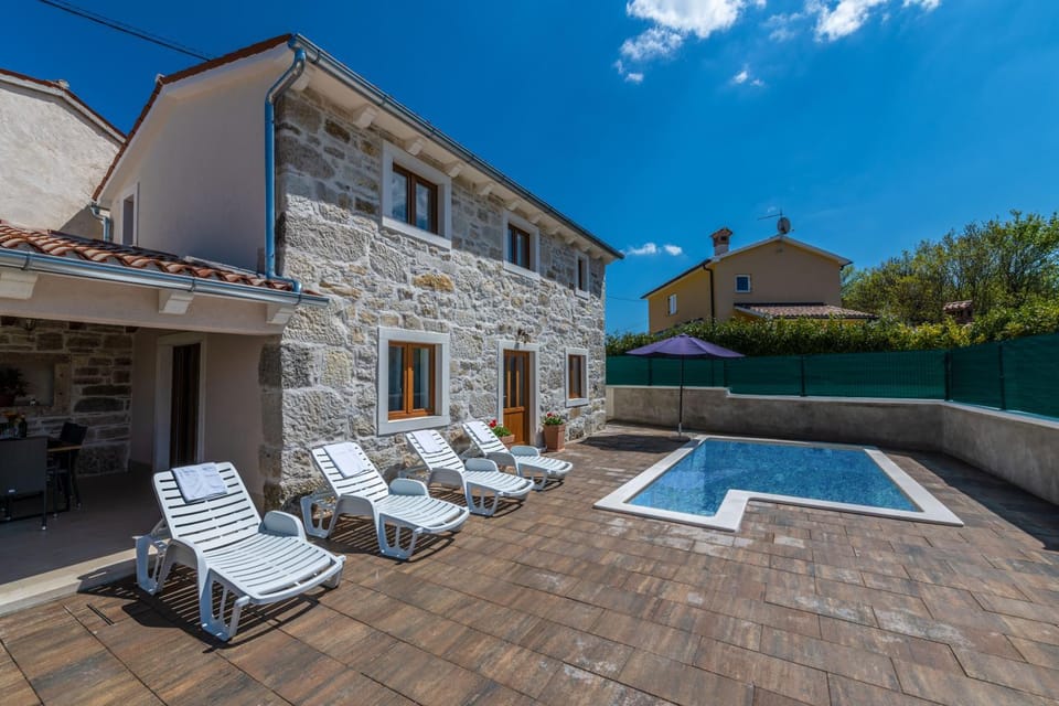 Property building, Patio, Pool view, Swimming pool, sunbed
