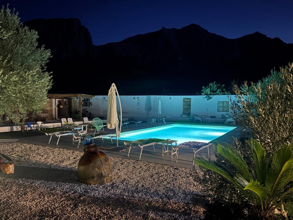 Patio, Night, Natural landscape, Mountain view, Pool view, Swimming pool, sunbed