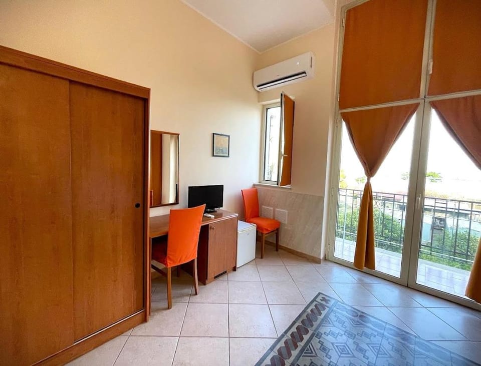 Photo of the whole room, Seating area, wardrobe, air conditioner