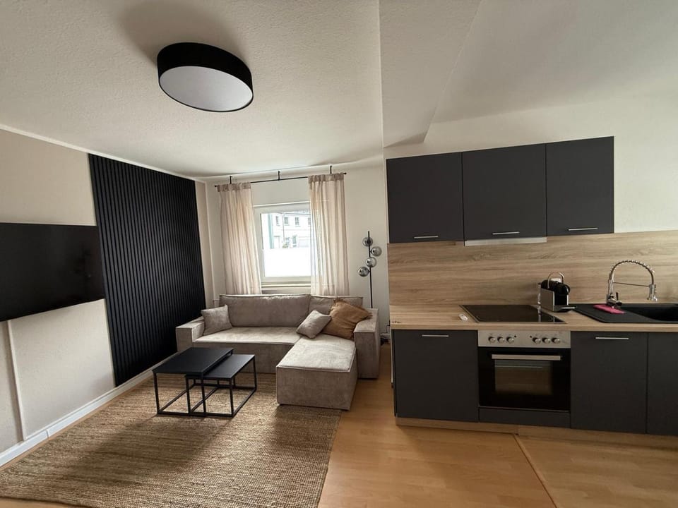 TV and multimedia, Kitchen or kitchenette, Living room, Photo of the whole room, Seating area, stove