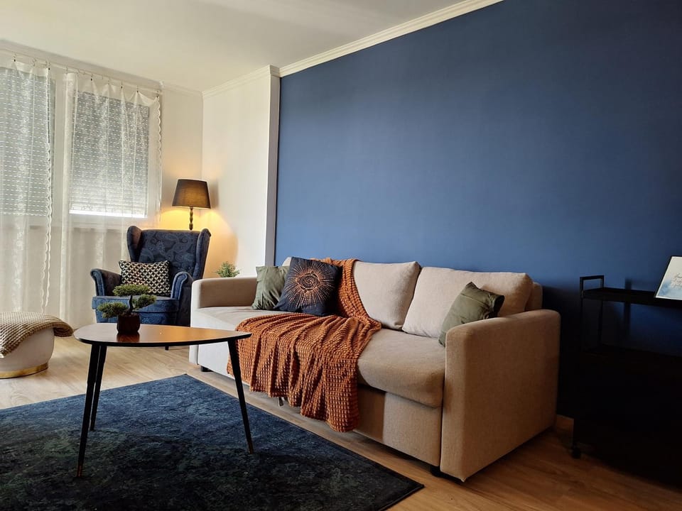 Bed, Living room, Seating area