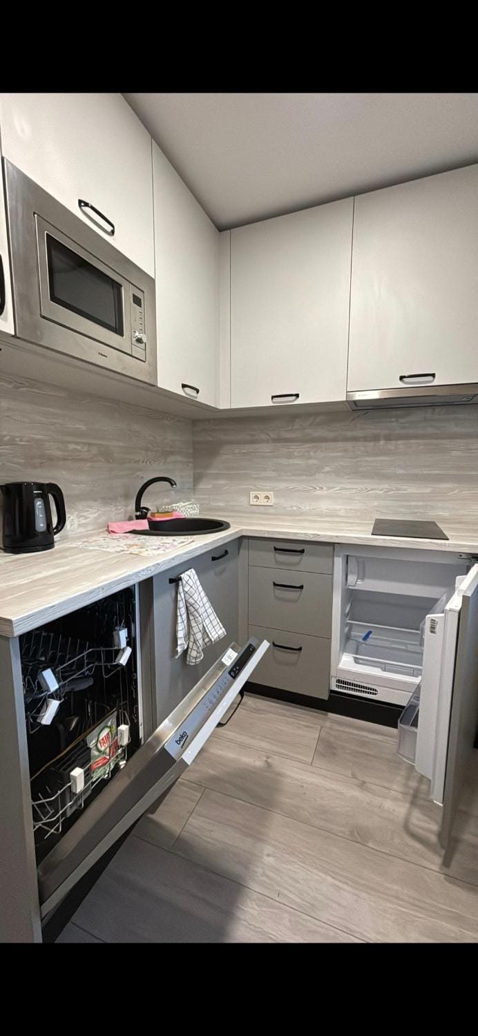 Kitchen or kitchenette, stove