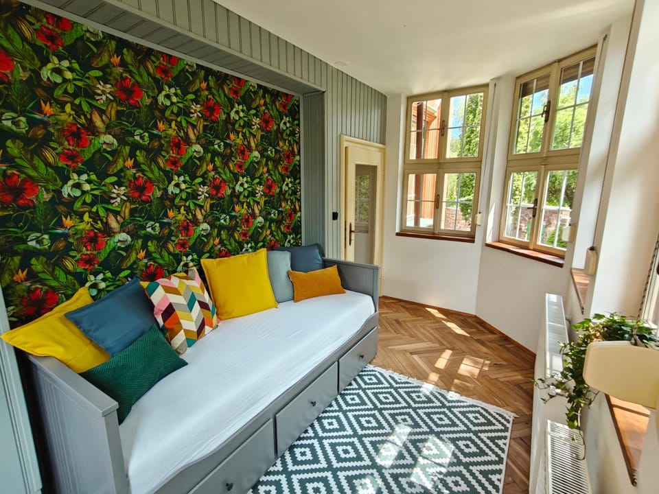Bed, Living room, Seating area, Bedroom