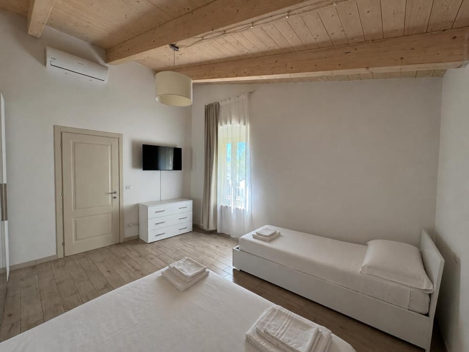Bed, TV and multimedia, towels, wardrobe, air conditioner