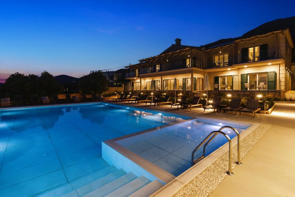 Property building, Night, Swimming pool, Swimming pool, sunbed