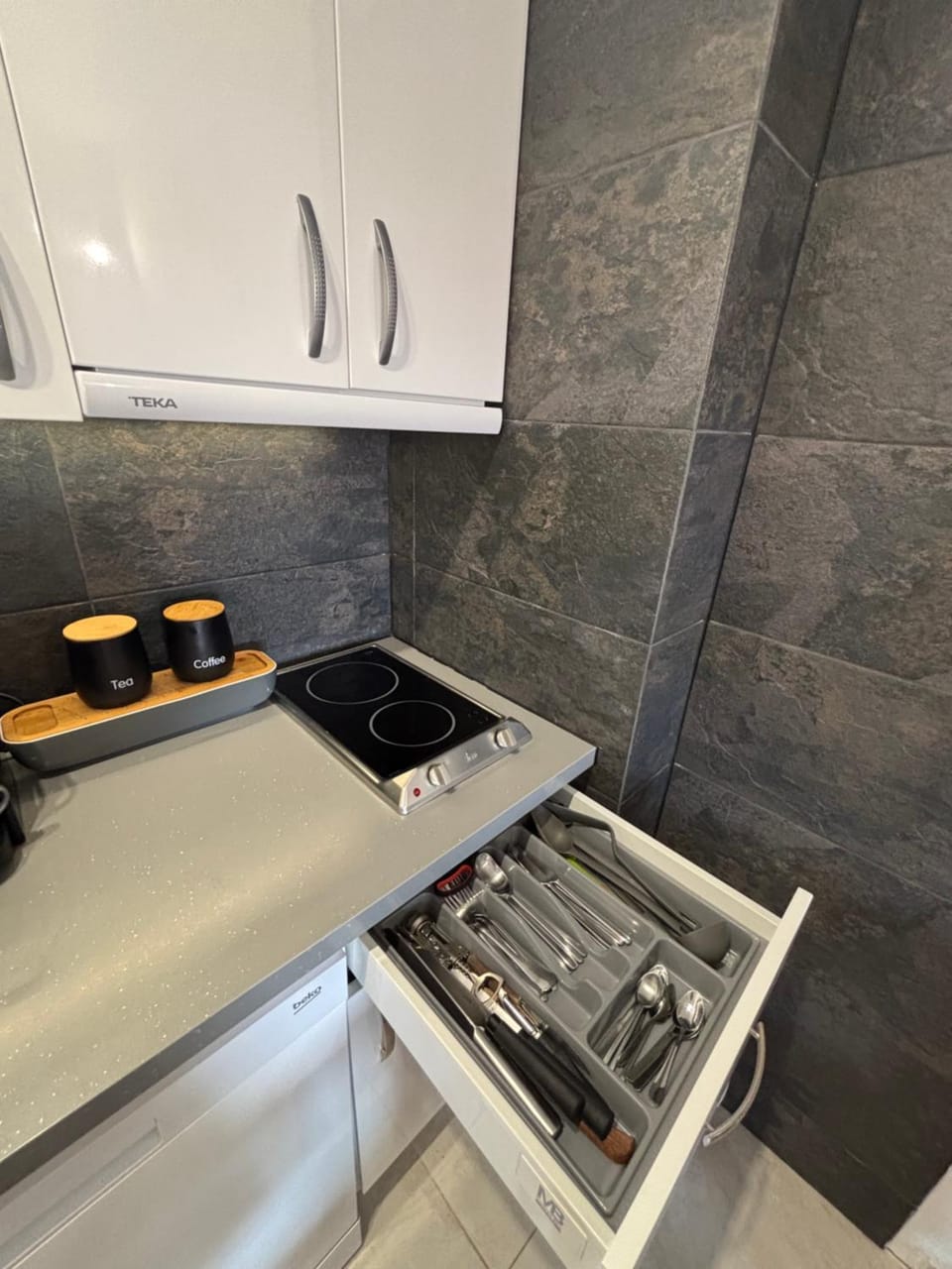 Kitchen or kitchenette, stove