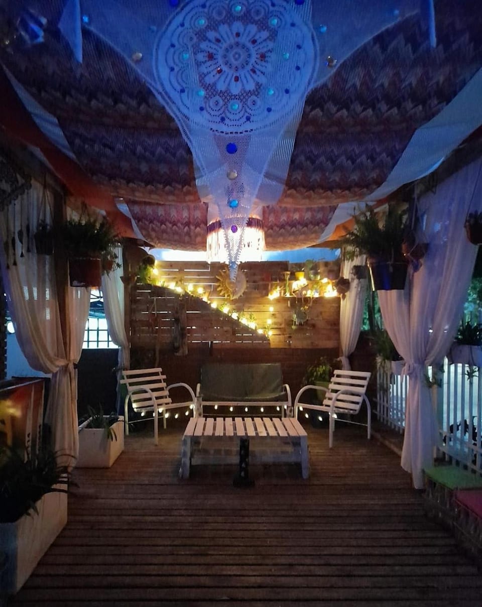 Patio, Off site, Night, Living room, Seating area, On site, City view, Garden view, Street view, Sunrise, Sunset