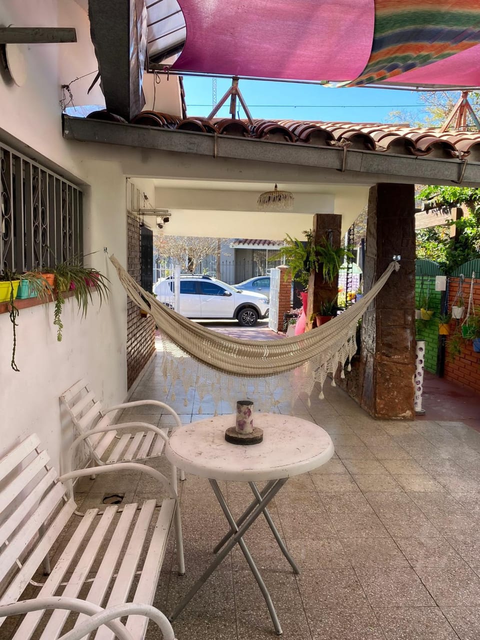 Property building, Patio, Off site, Day, View (from property/room), Living room, Seating area, furniture, sunbed