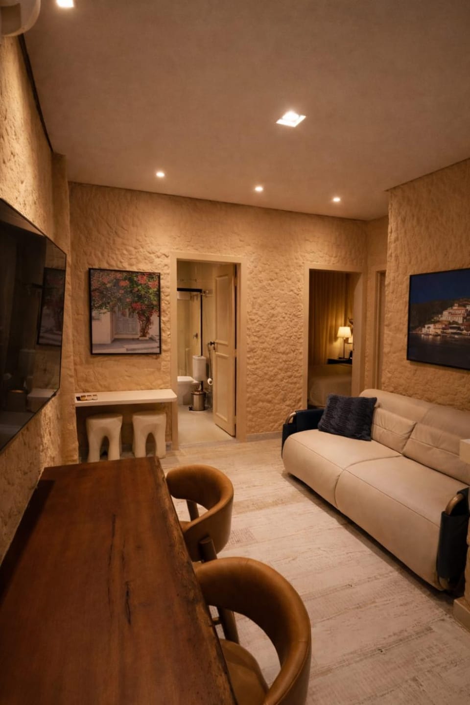 Bed, TV and multimedia, Living room, Seating area, Bedroom