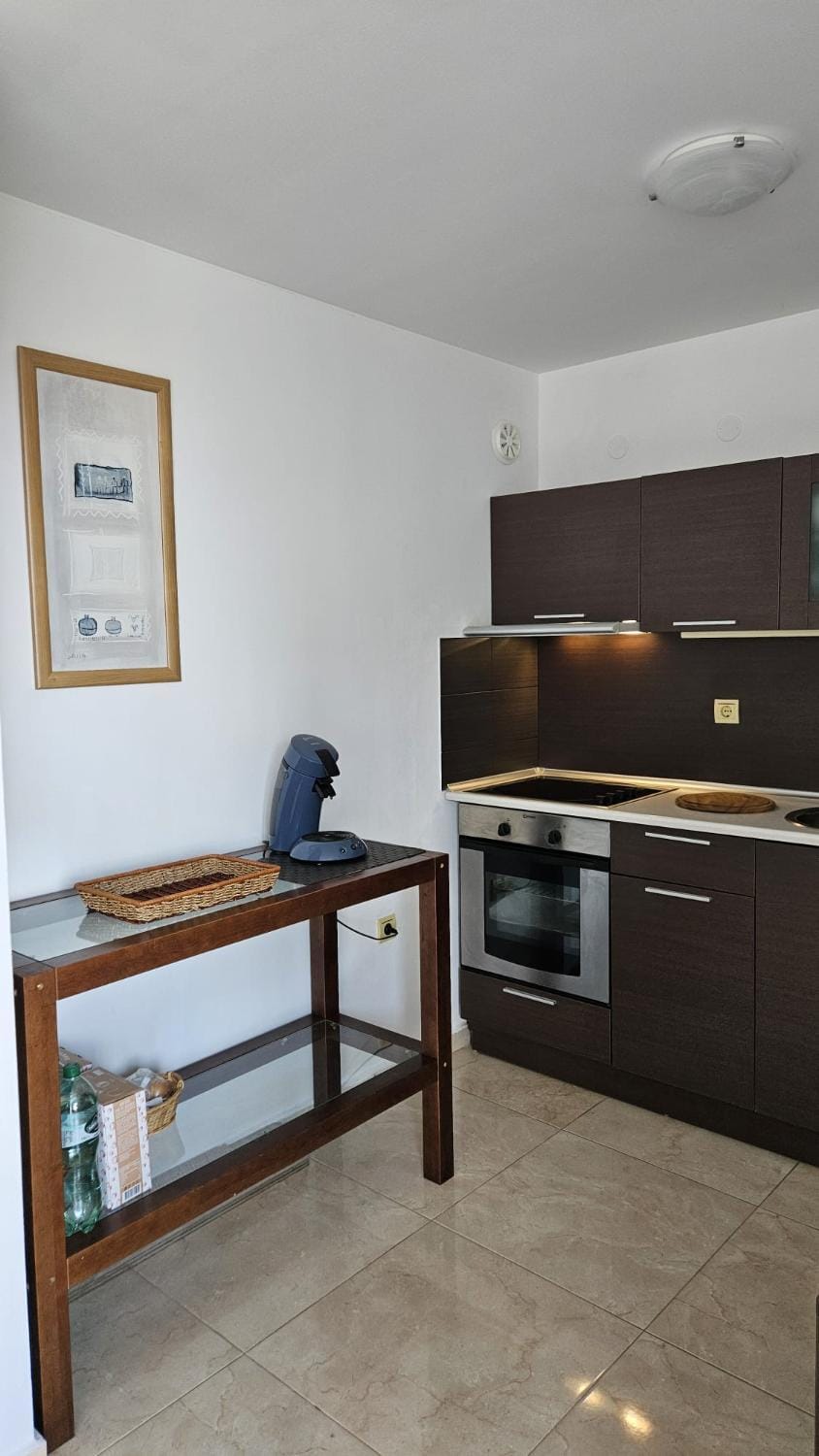 Kitchen or kitchenette, stove