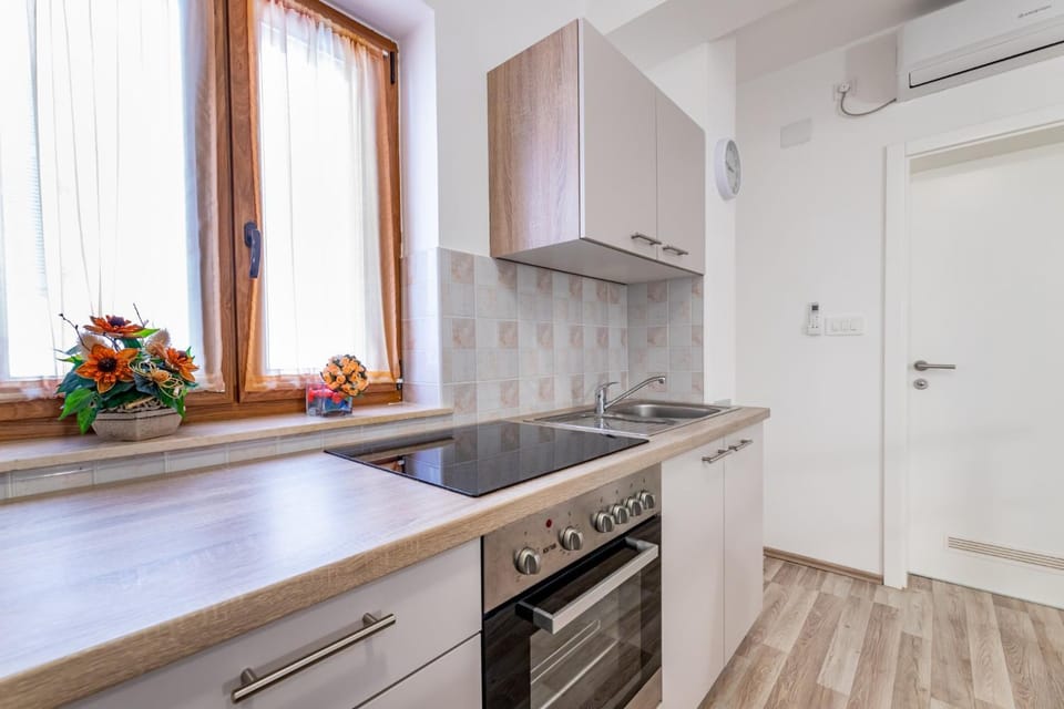Kitchen or kitchenette, stove