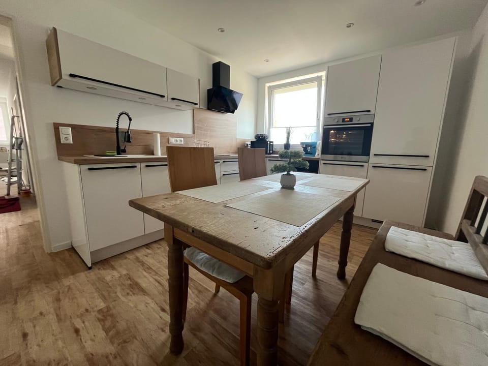 Kitchen or kitchenette, dishwasher, oven, stove, toaster