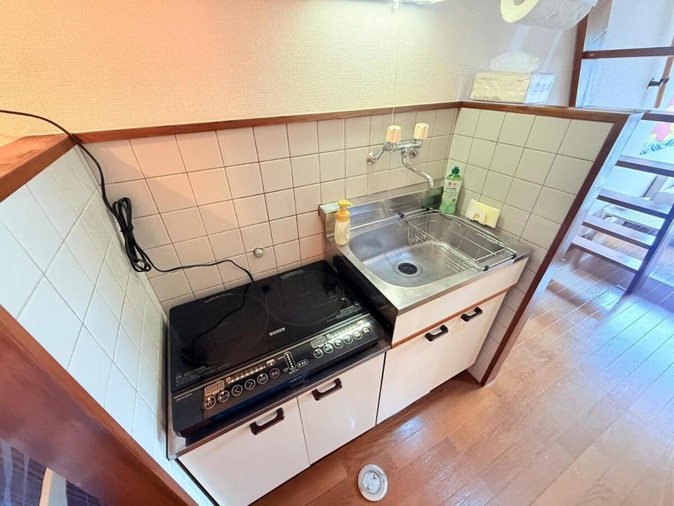 Kitchen or kitchenette, stove