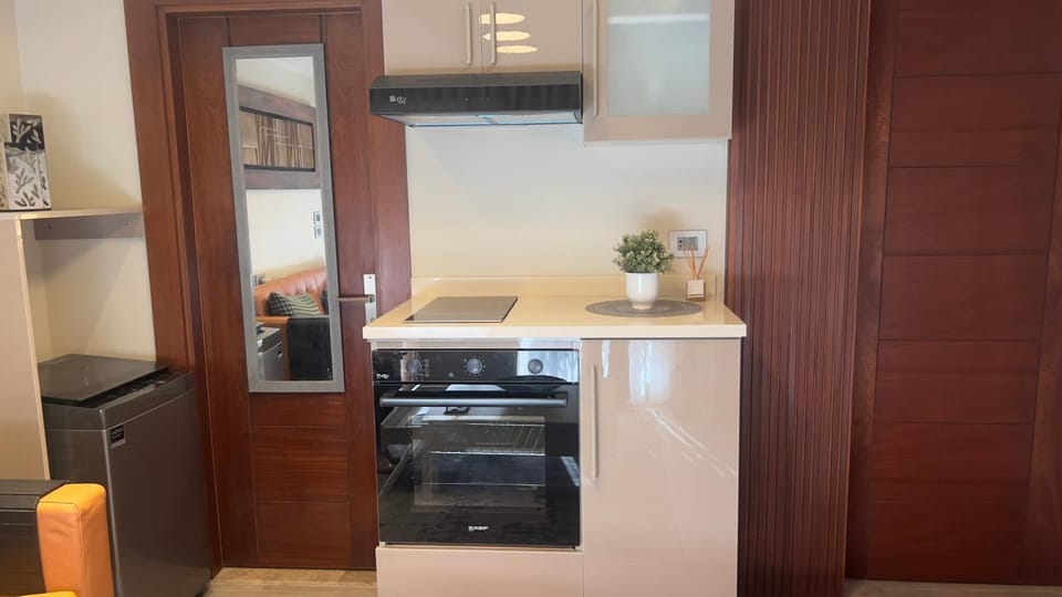 Kitchen or kitchenette, oven, stove
