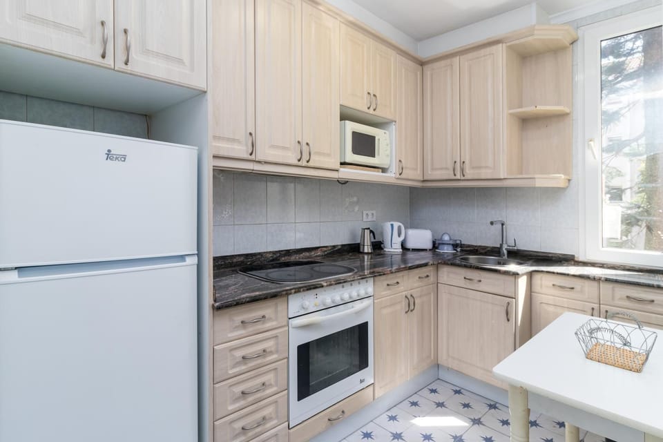 Kitchen or kitchenette, oven, stove, toaster