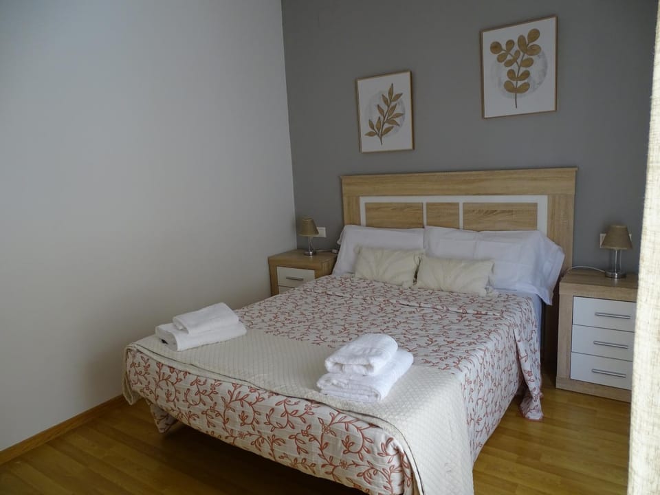 Bed, Bedroom, heating, storage, towels, wardrobe, air conditioner
