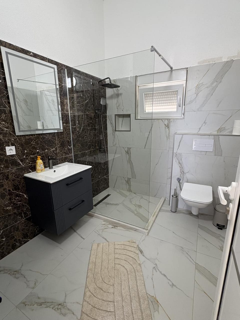 Shower, Toilet, Bathroom, hair dryier, towels