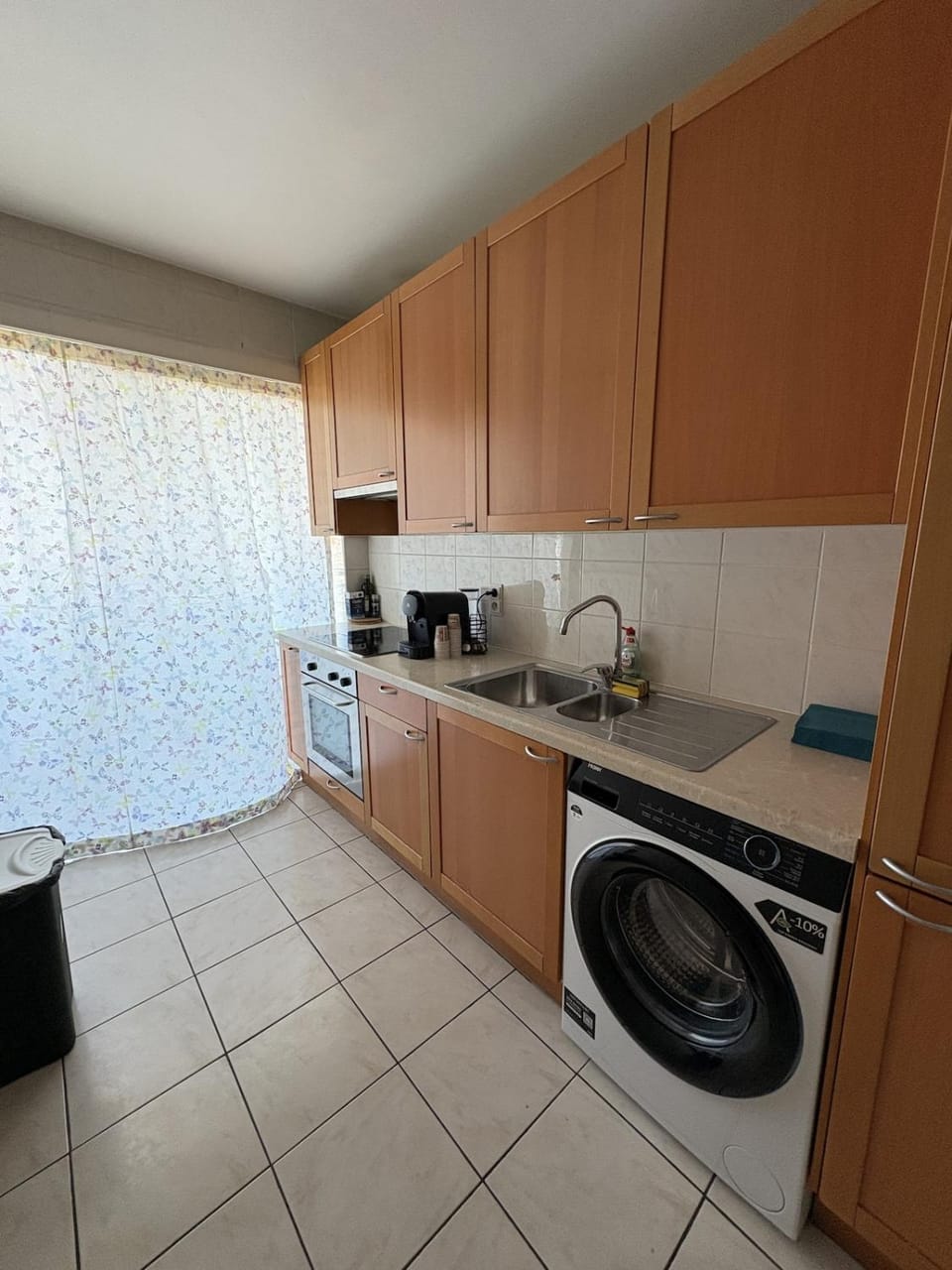 Kitchen or kitchenette, washing machine