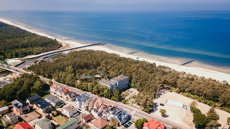 Property building, Nearby landmark, Day, Natural landscape, Bird's eye view, Beach, City view, Sea view