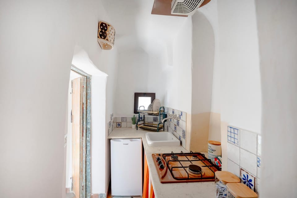 Kitchen or kitchenette, oven, stove