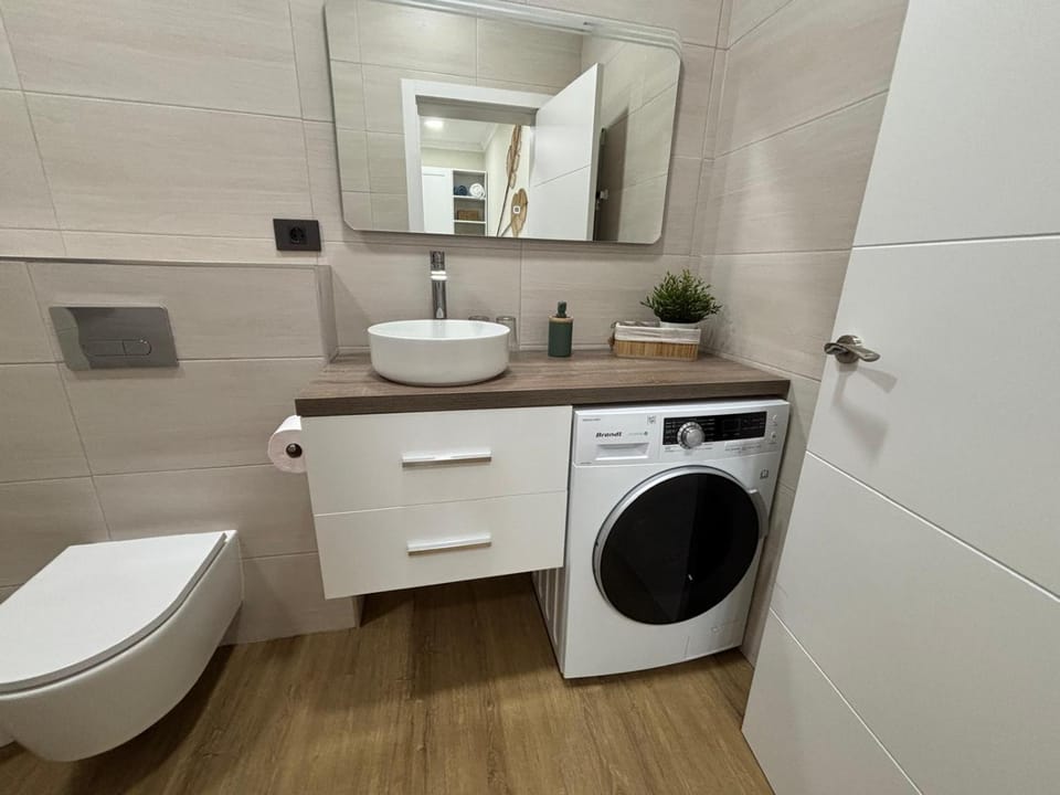 Bathroom, towels, washing machine, dryer