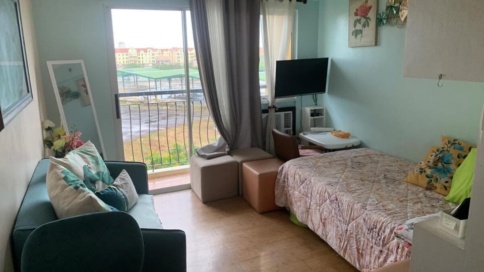 Go to AG0DA app San Remo Oasis Studio Type for booking thanks Apartment in Cebu City