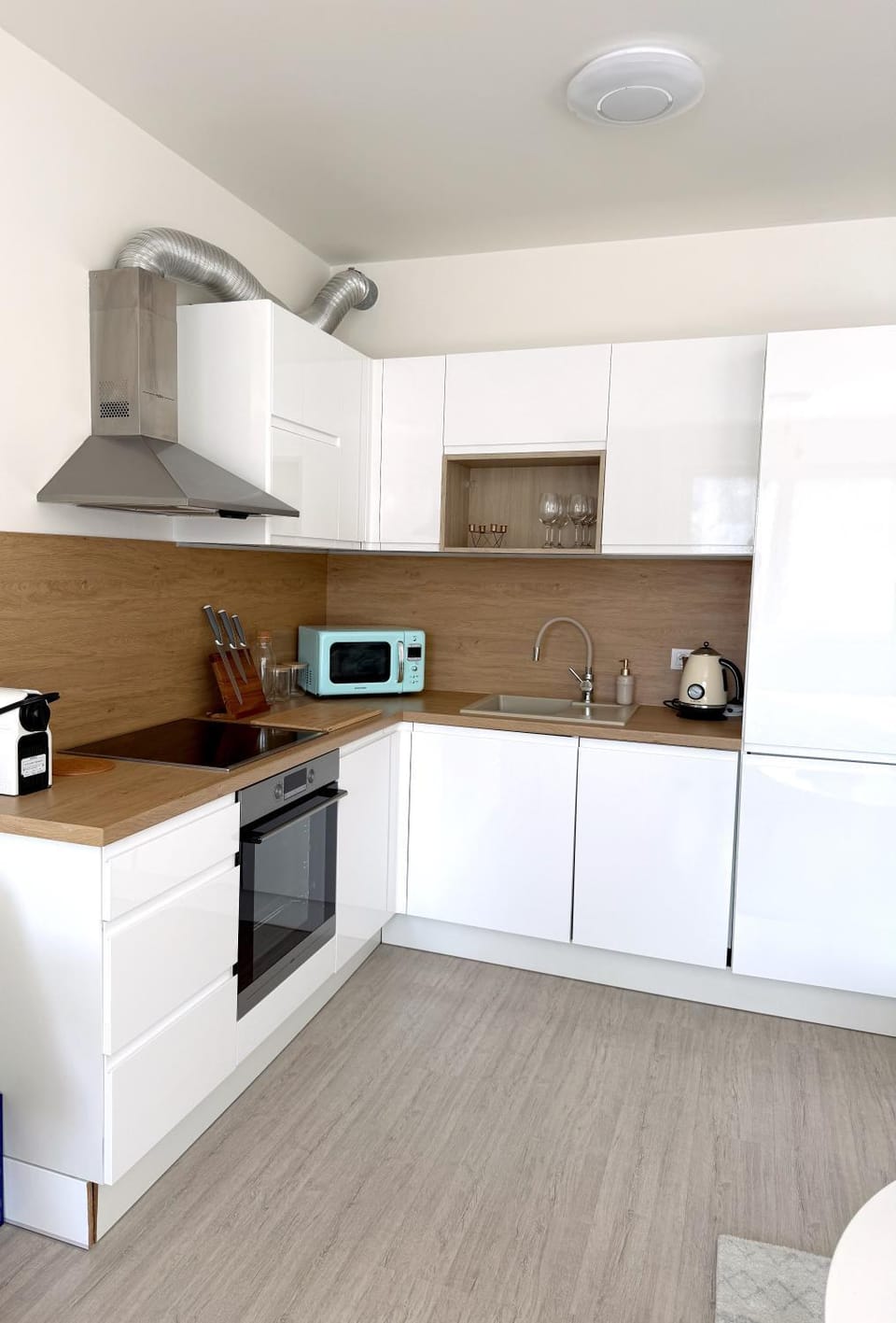 Kitchen or kitchenette, dishwasher, oven, stove